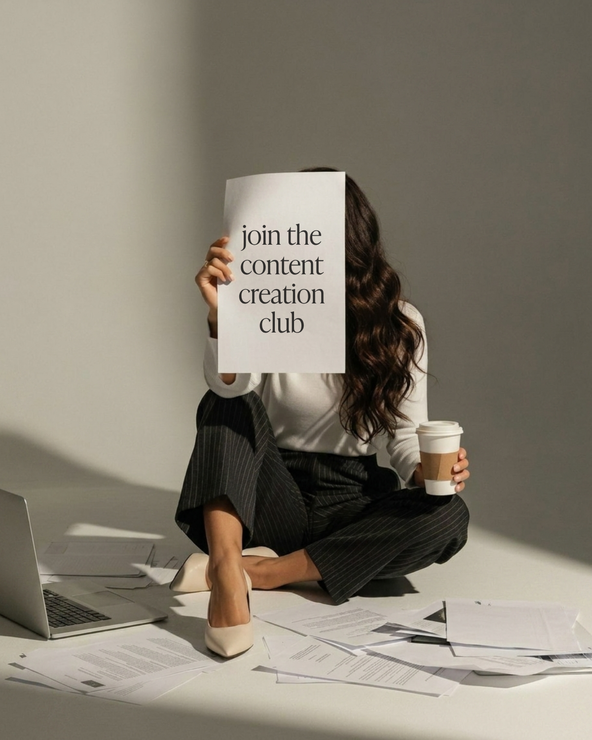 Creator holding a printed content planning sheet